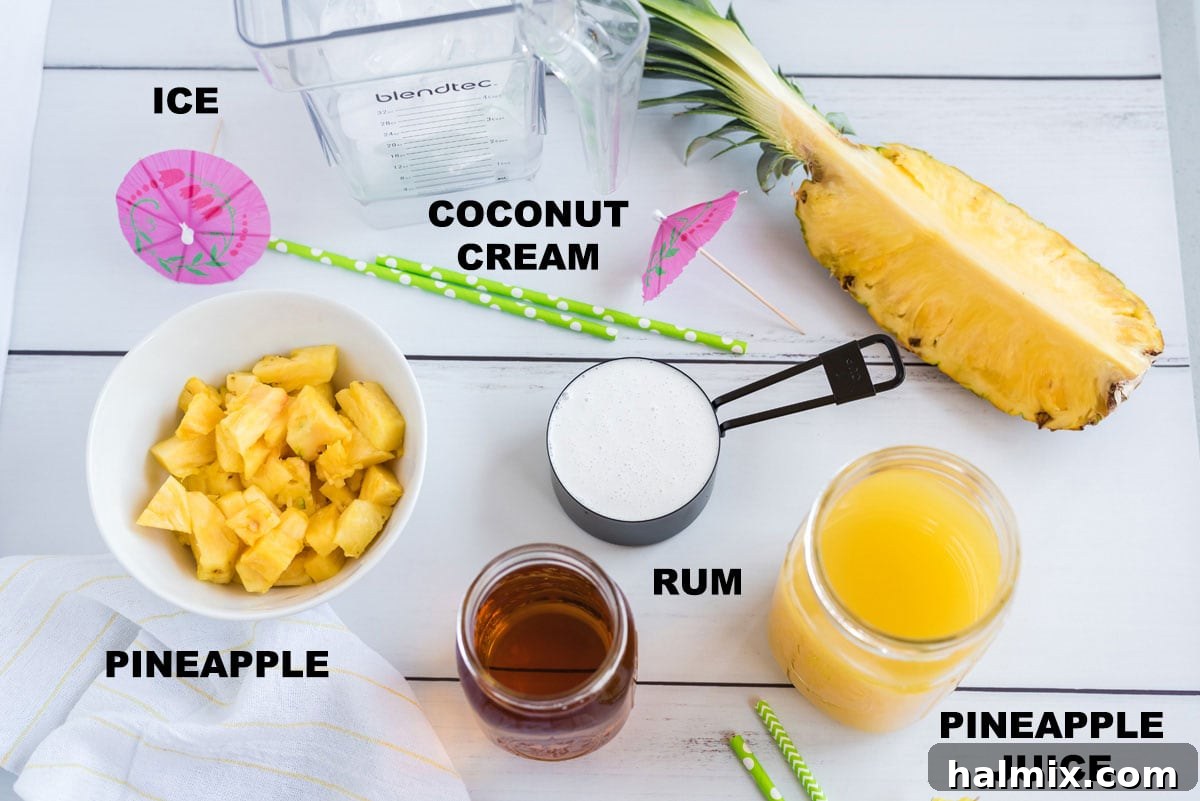 A display of fresh pineapple, coconut cream, pineapple juice, and rum – all the key ingredients for a homemade Pina Colada.