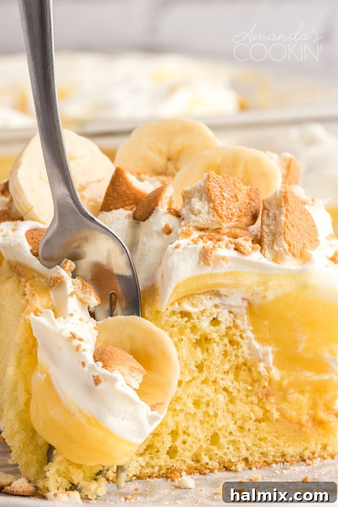 fork taking some poke cake