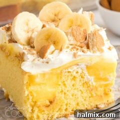 A piece of banana pudding poke cake on a plate