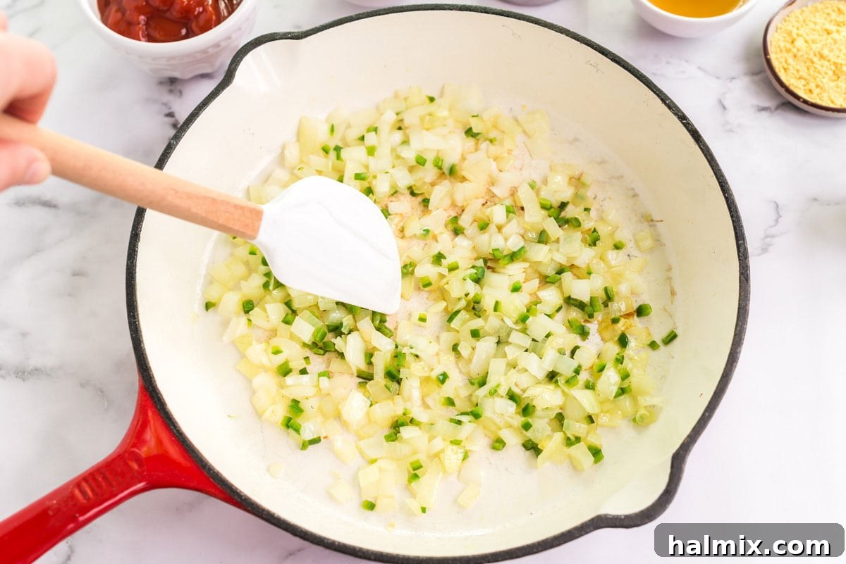 skillet with onion and jalepeno