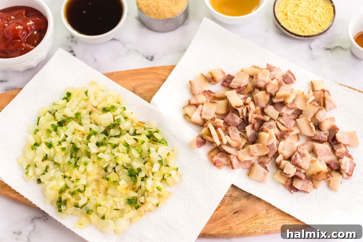 onion mixture and bacon draining on paper towels