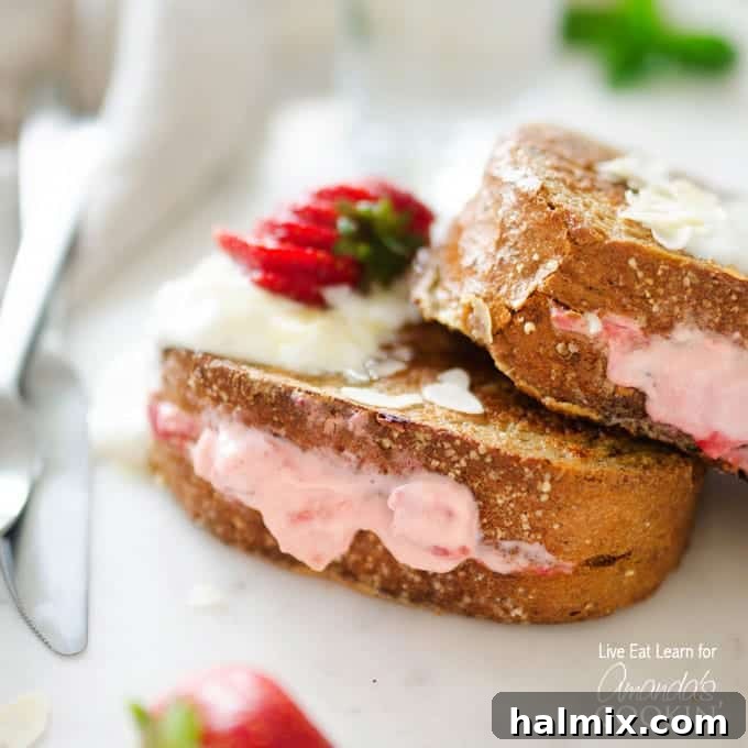 This French toast is stuffed with sweet strawberries and cream filling. Turn your usual breakfast into something amazing - Strawberry Stuffed French Toast! French toast stuffed with strawberry and cream cheese