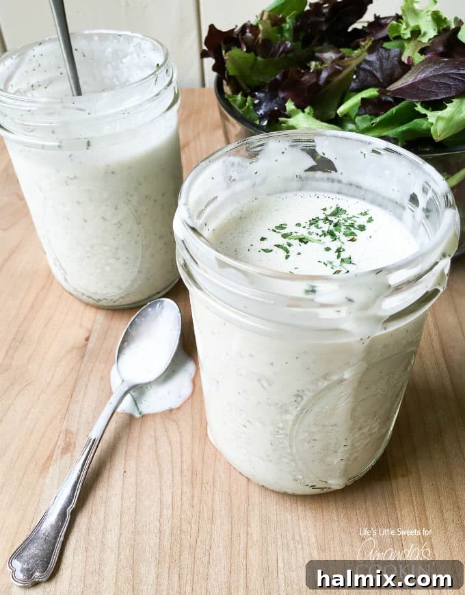 Try this delicious buttermilk ranch dressing recipe at home instead of buying another bottle. This homemade ranch dressing is creamy, delicious and fresh! Three mason jars filled with homemade buttermilk ranch dressing, ready for storage or serving
