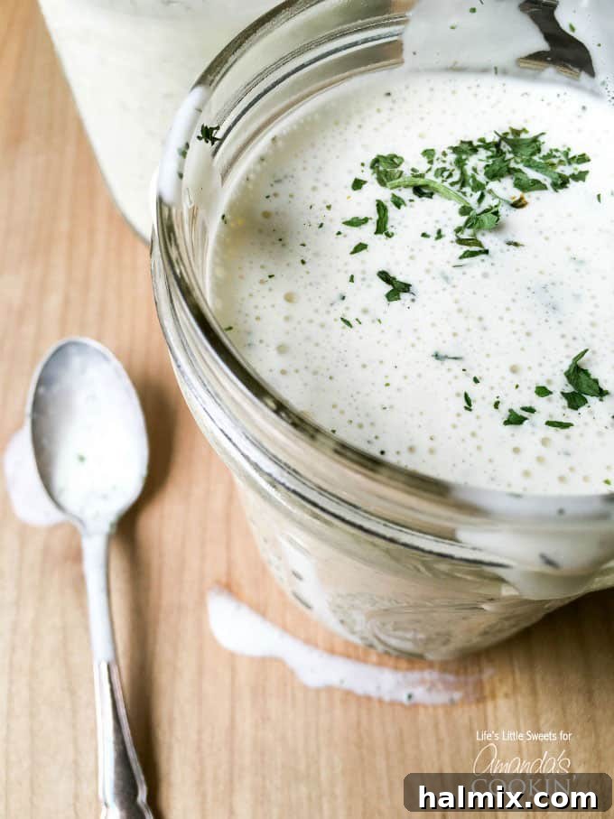 Try this delicious buttermilk ranch dressing recipe at home instead of buying another bottle. This homemade ranch dressing is creamy, delicious and fresh! A mason jar filled with creamy homemade buttermilk ranch dressing, ready to be stored in the refrigerator