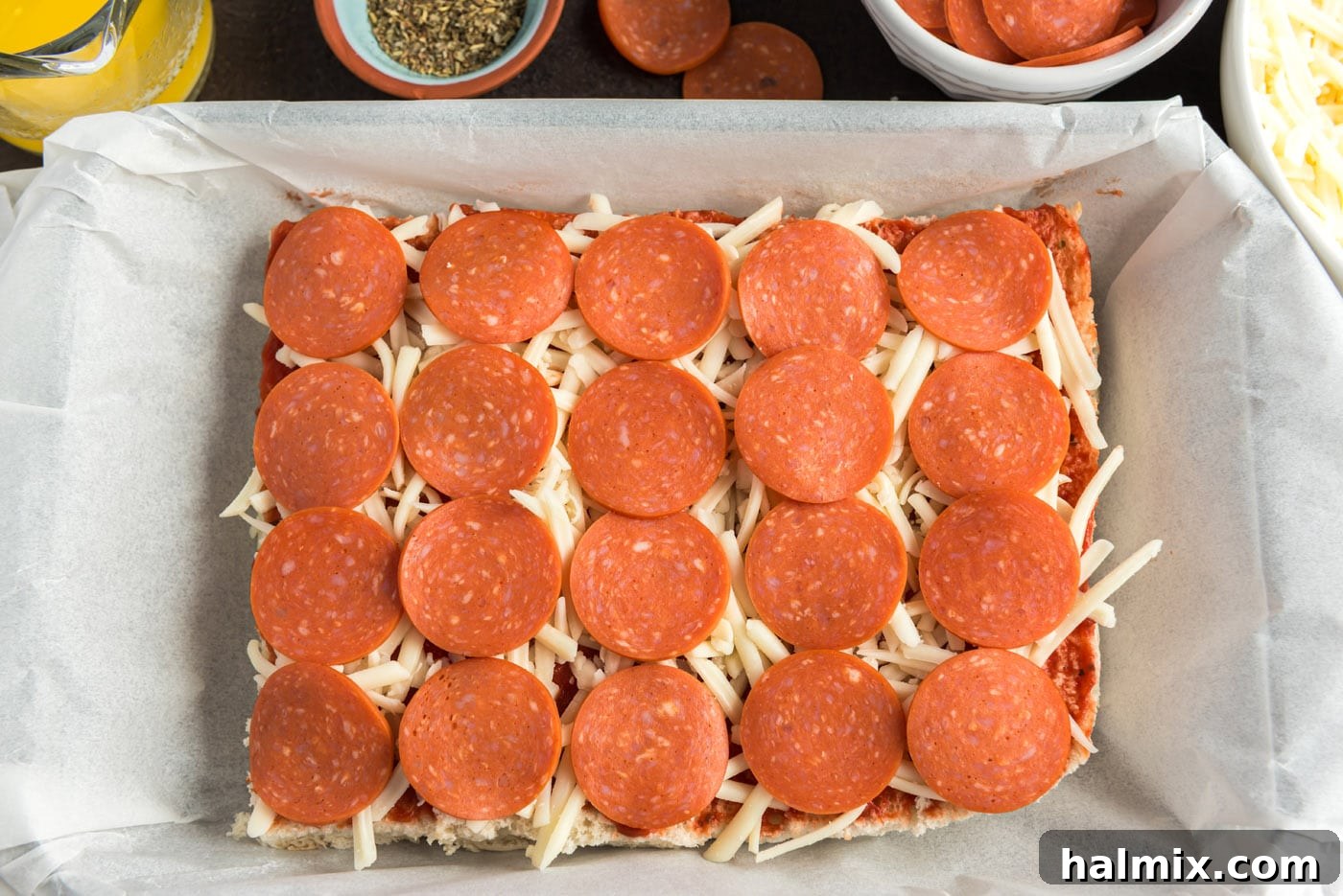 Cheesy Pizza Buns 8 pepperoni slices on top of mozzarella and pizza sauce