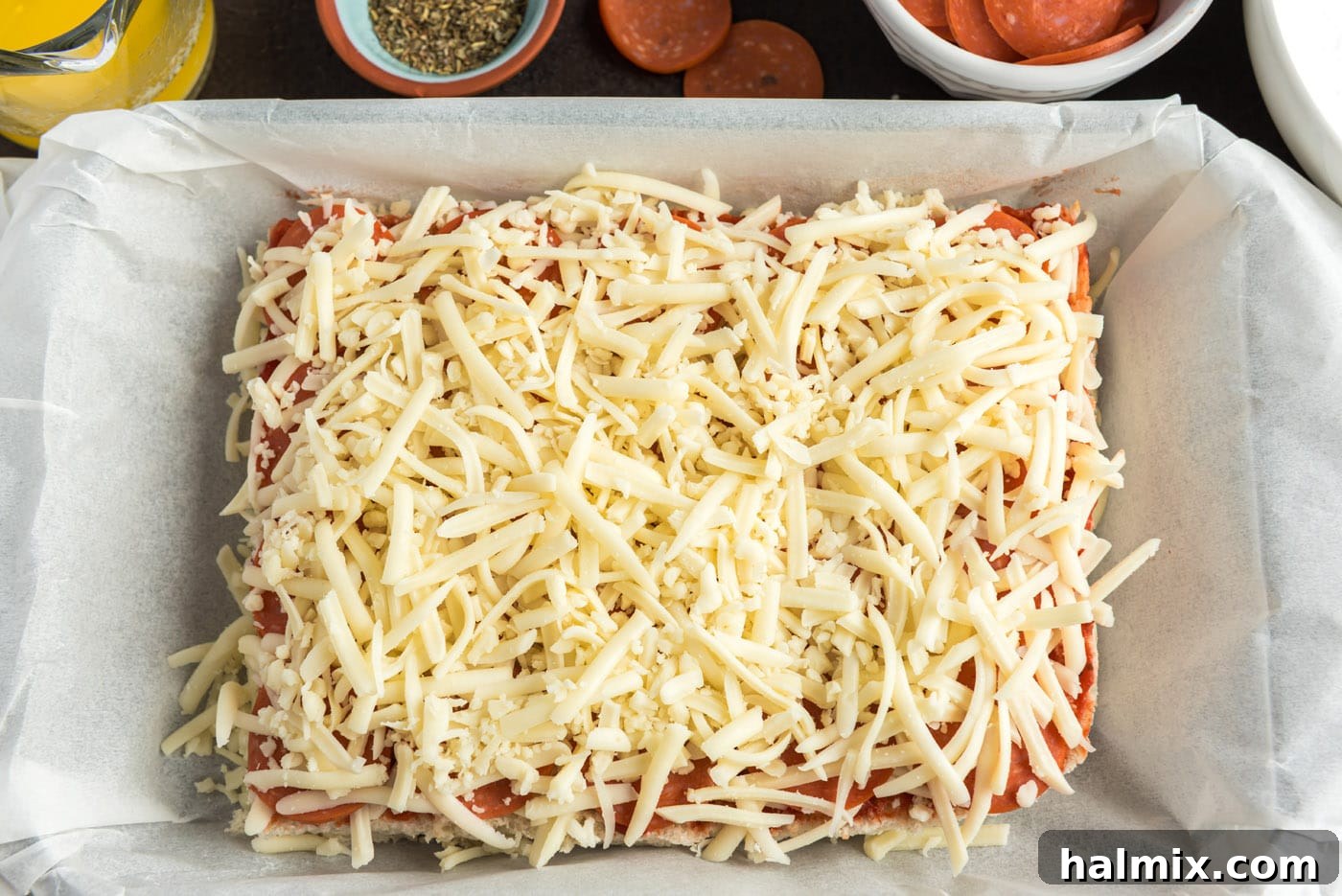 Cheesy Pizza Buns 9 layer of cheese on top of pepperoni pizza sliders