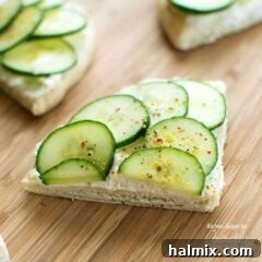 cucumber sandwich on cutting board