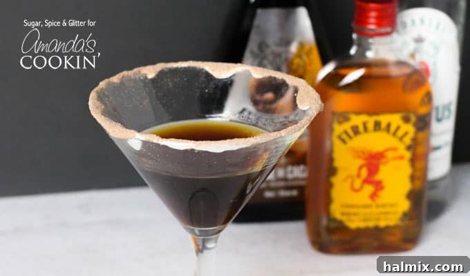 Toasted Smores Martini 4 A S'mores Martini with a mesmerizing flame dancing on its surface, ready for a spectacular presentation.
