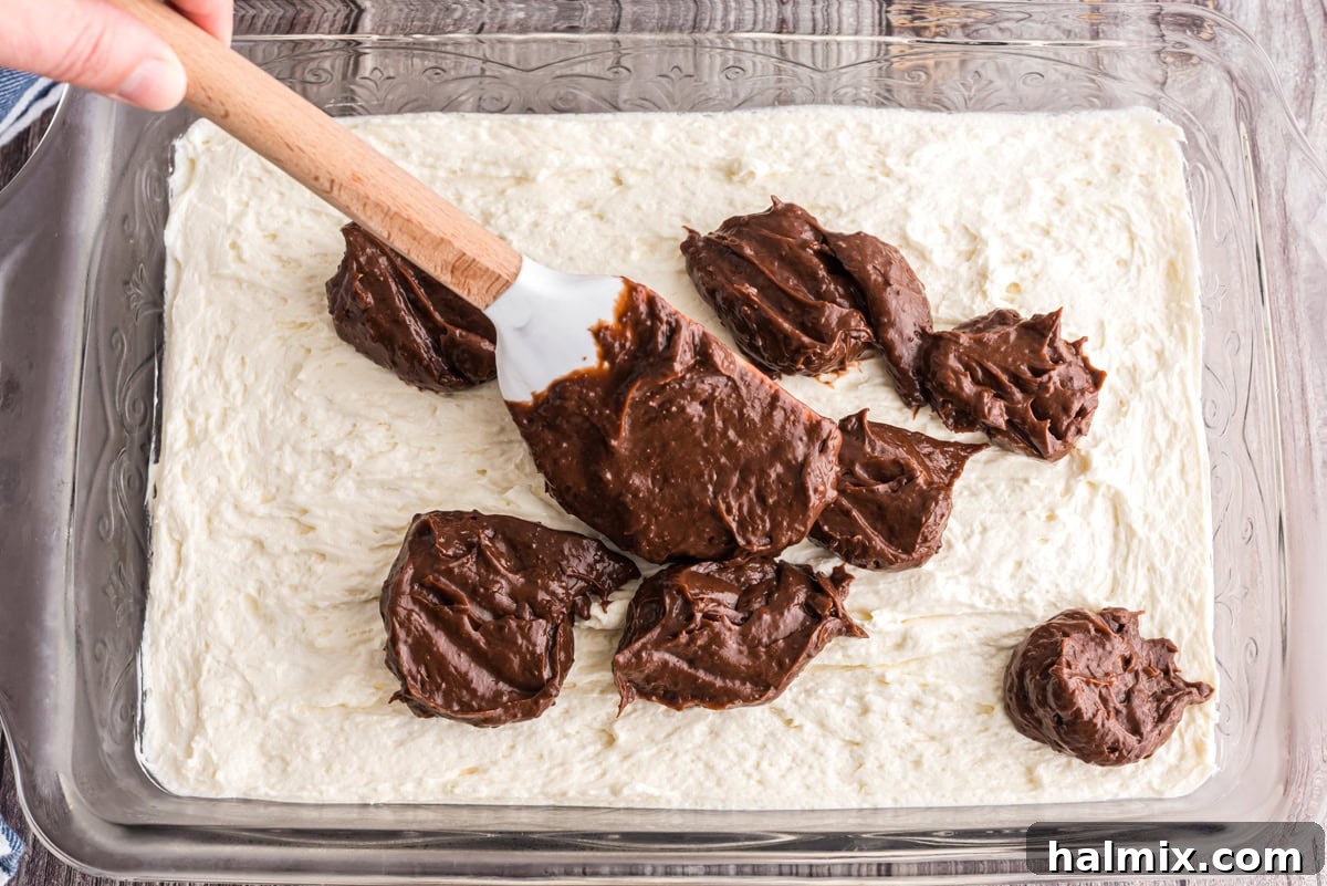 Pudding mixture spooned on top of the cream cheese mixture