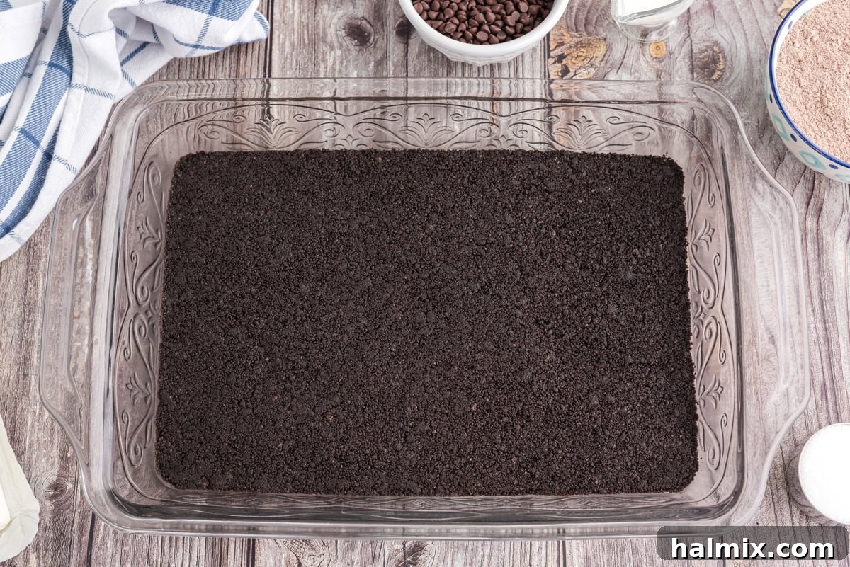 Cookie crumb mixture pressed into a 13x9 baking dish