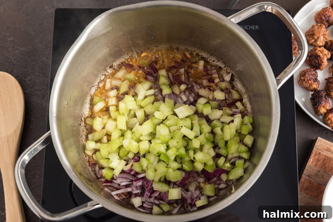 Savory Sausage Orzo Medley 6 onion and celery added to soup pot with sausage and orzo