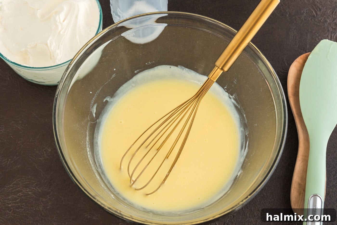 Enchanted Chocolate Pumpkin Cake 12 vanilla instant pudding in a bowl with a whisk