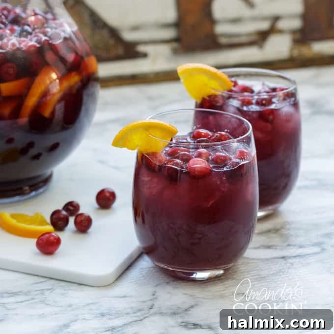 two glasses of sangria with orange wedge
