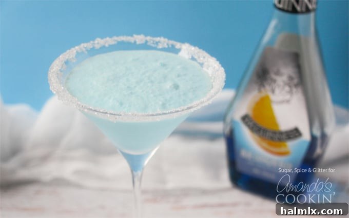 A close up of a blended frostbite martini in a clear martini glass.
