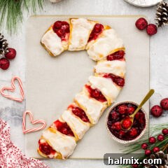 Close up photo of a Candy Cane Danish on parchment paper
