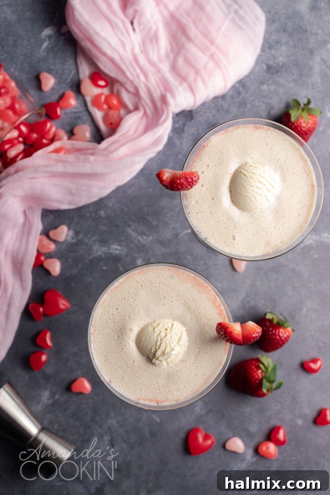 Overhead view of a beautifully garnished Pink Mudslide cocktail, ready to be enjoyed for Valentine's Day.