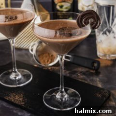 Baileys chocolate martini in a clear martini glass with another one behind it
