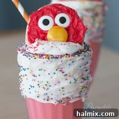 elmo cookie in top of freakshake