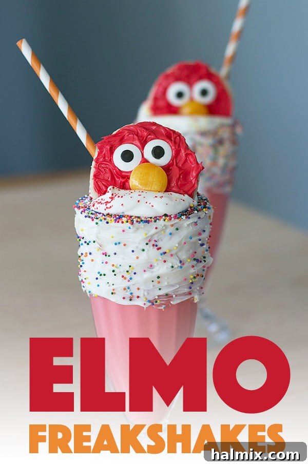 Elmo Freakshakes! This super simple recipe transforms a classic milkshake into a fun, character-themed dessert that kids will adore. Perfect for Sesame Street parties or a whimsical treat at home. #elmo #sesamestreet #birthdayparty #milkshake #freakshakes #icecream #kidsdessert