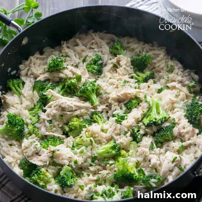 Creamy One Skillet Chicken Broccoli and Rice, ready to serve as a delicious and easy dinner dish.
