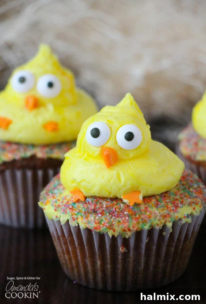 These cute Easter Chick Cupcakes are a quick & easy Easter dessert, fit to feed a crowd! Great for a holiday gathering or as a fun recipe to do with kids. #cupcakes #easter #easterdessert #spring #cupcakerecipes #easterrecipes Adorable Easter themed cupcakes decorated as yellow chicks