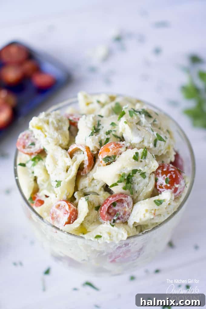 Vibrant Pesto Tortellini Salad 2 tortellini pasta salad in glass dish