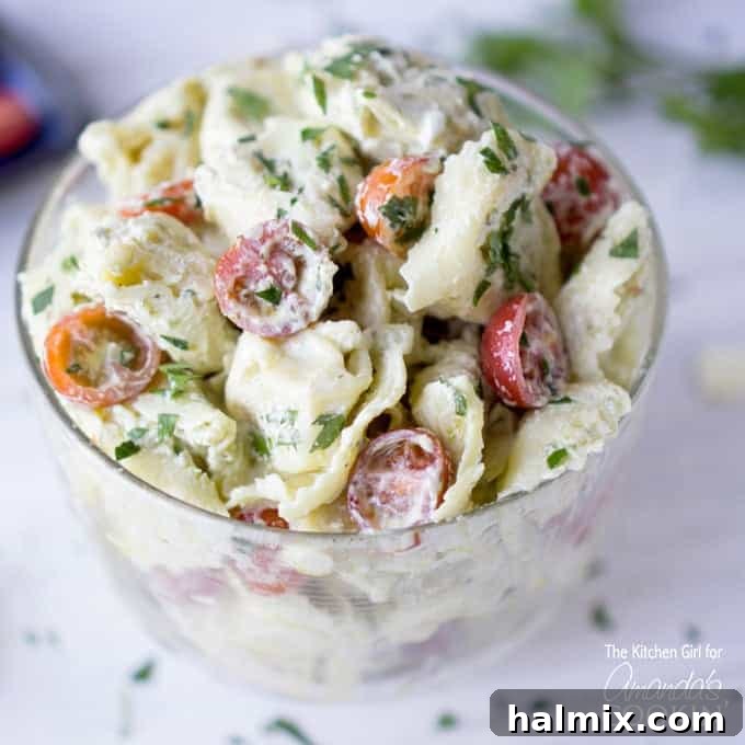 Vibrant Pesto Tortellini Salad 3 tortellini pasta salad in glass dish