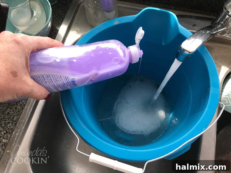 Simple soap and water are all you need for effective gas grill cleaning.