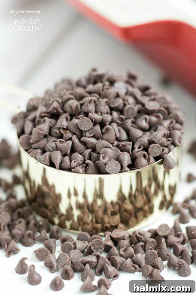 Measuring cup filled with mini chocolate chips