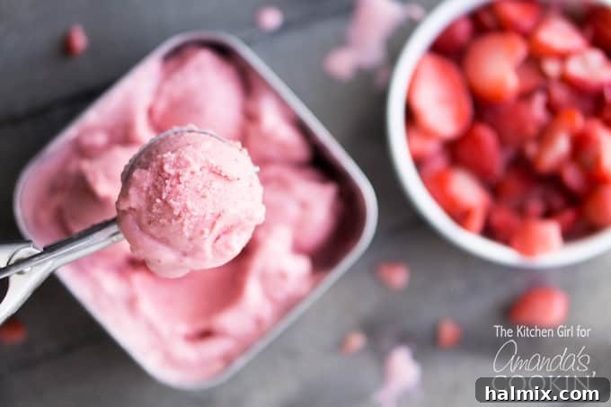 Scoop of strawberry frozen yogurt