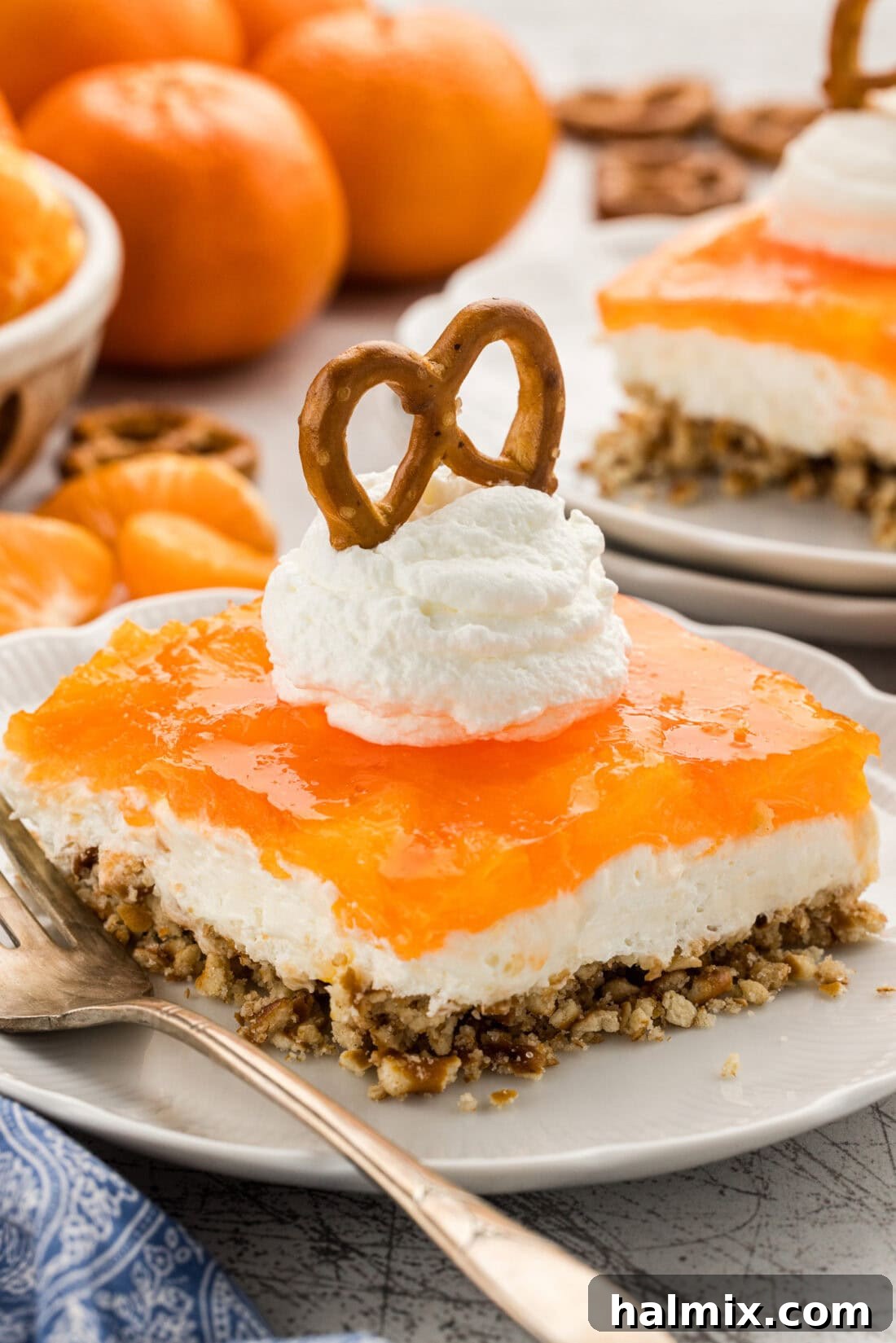 Sweet & Salty Orange Pretzel Bliss 2 slice of Orange Pretzel Salad with whipped cream