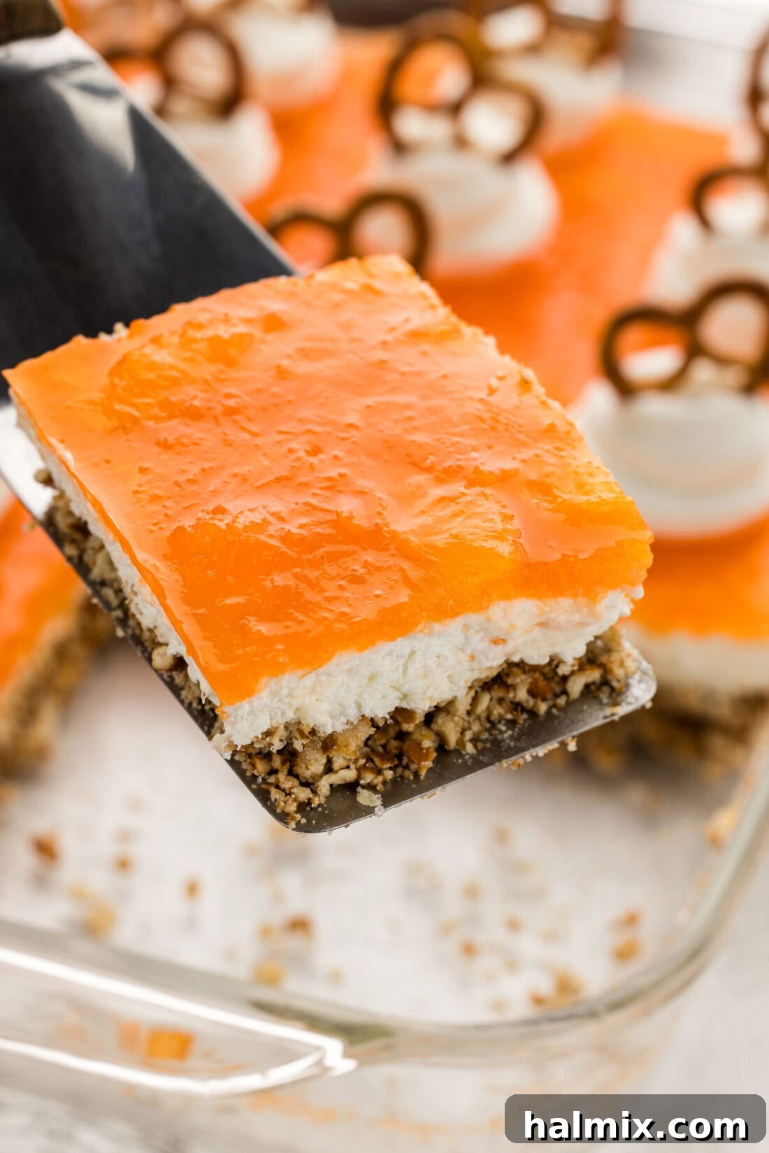Sweet & Salty Orange Pretzel Bliss 12 slice of Orange Pretzel Salad on spatula