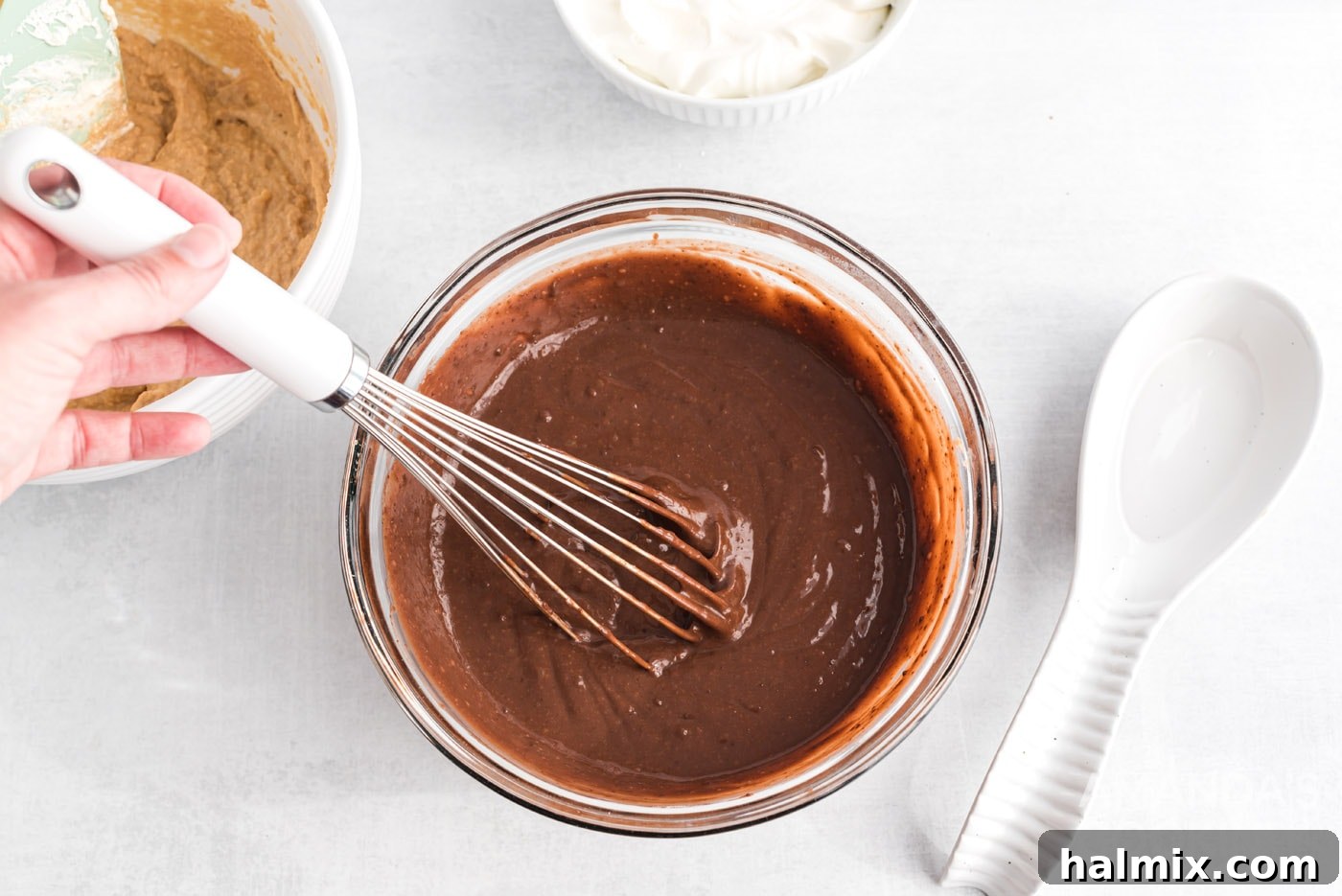 whisking instant pudding in a bowl
