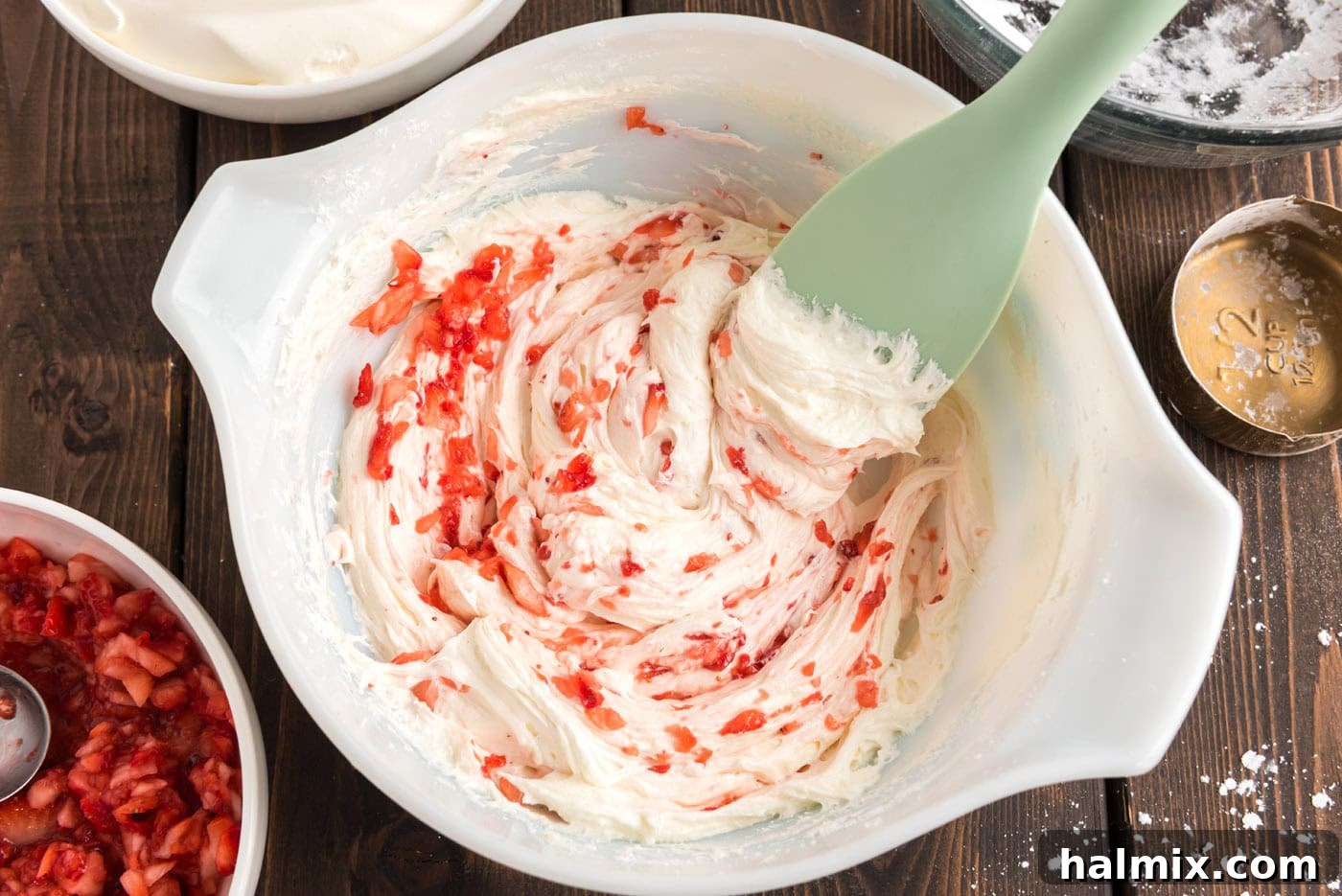 strawberry and cream cheese mixture in a bowl