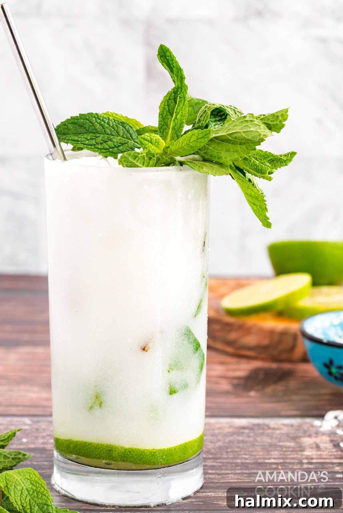 Close-up of a beautifully prepared Coconut Mojito cocktail, highlighting the refreshing mint and the tropical essence of coconut rum.
