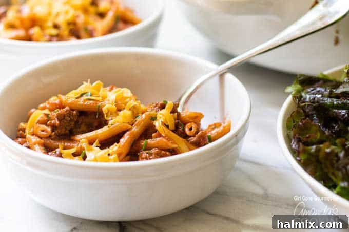 Sloppy Joe Skillet Pasta 3 A close-up shot of a bowl of One Pot Sloppy Joe Pasta, showcasing the rich, red sauce, tender pasta, and savory ground beef, ready to be enjoyed.
