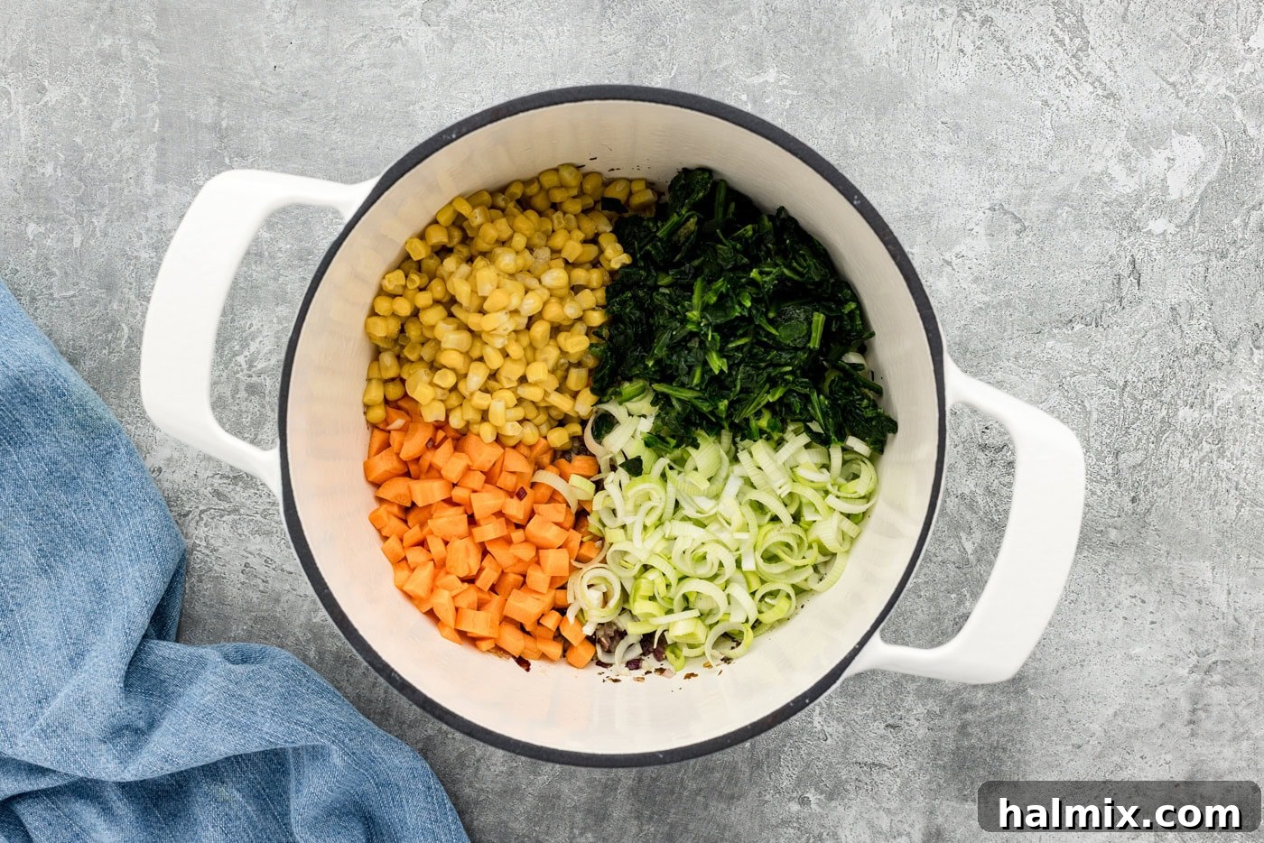 Garden Harvest Rice Soup 6 spinach, corn, carrots, and leeks added to a soup pot with onions and spices