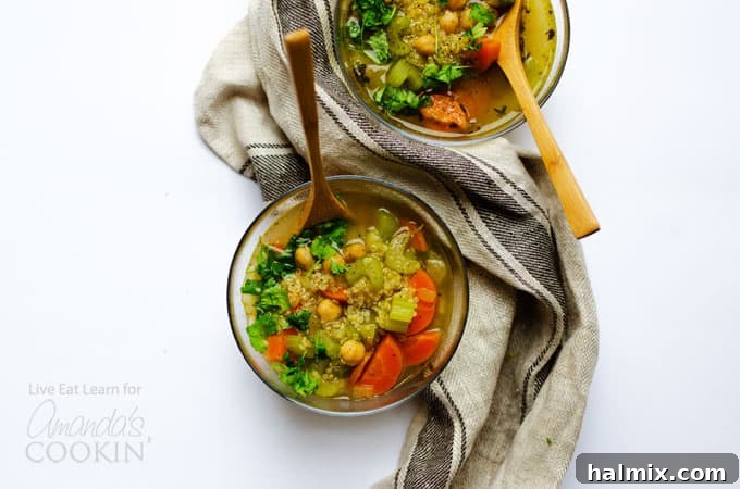 Comforting and Nutritious Winter Soup Recipe Two bowls of vibrant healthy vegetable soup garnished with fresh parsley, ready to be enjoyed, highlighting the warmth and freshness of the dish.