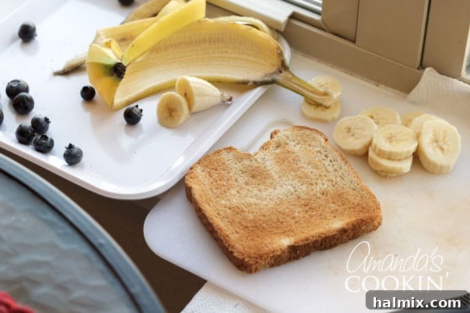 First step: cutting banana slices for Paddington Bear toast