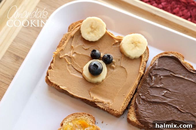 Fourth step: placing blueberry eyes on the teddy bear toast