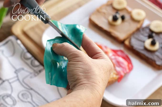 Fifth step: cutting fruit roll-ups for Paddington's hat and collar