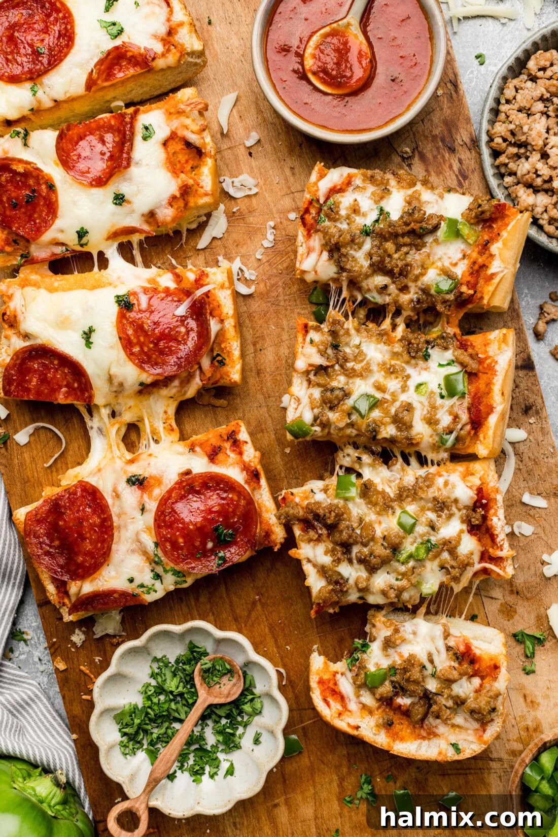 sliced french bread pizza on a wooden board