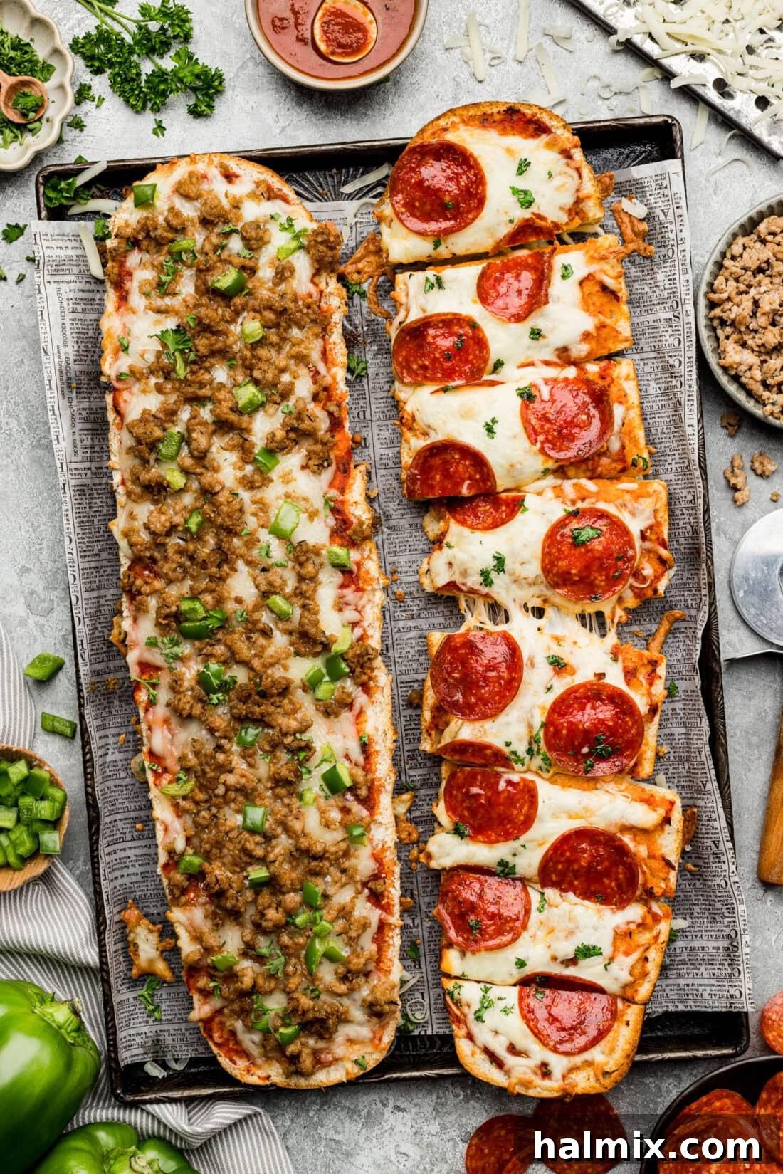 overhead photo of french bread pizza on a baking sheet