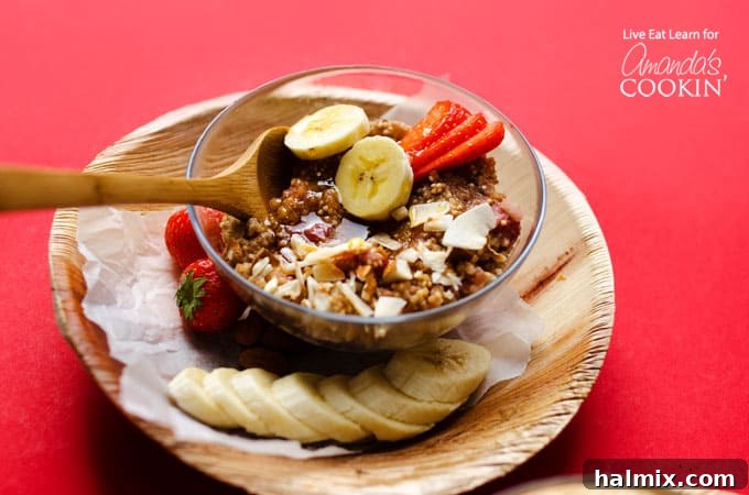 Warm and Nutritious Slow Cooker Breakfast Quinoa Breakfast quinoa in a bowl with various fresh fruit toppings, ready to eat