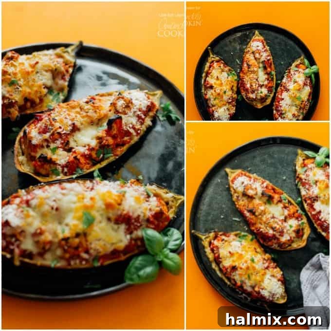 Four stuffed eggplant parmesan halves baked on a baking sheet, ready to serve