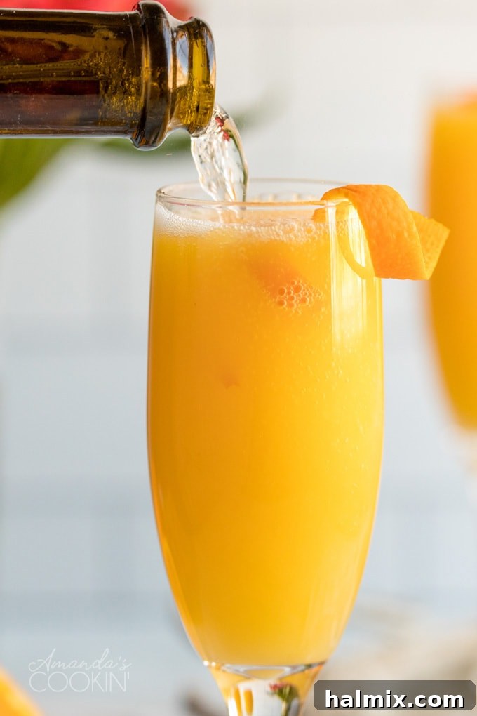 Champagne being poured into a flute