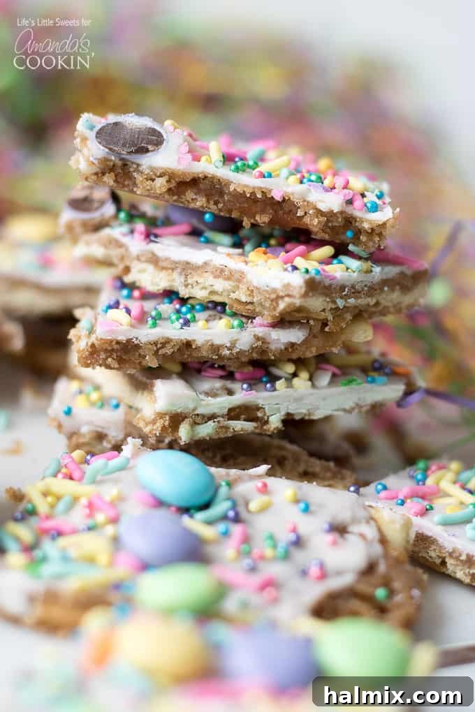 This Easter crack is a festive Saltine Toffee. An easy-to-make recipe using simple pantry ingredients like white chocolate, sprinkles, and Easter candies. #easterdessert #easter #eastercandy #saltinetoffee #saltinecrack #whitechocolate #holidaydessert Easter crack for spring and Easter