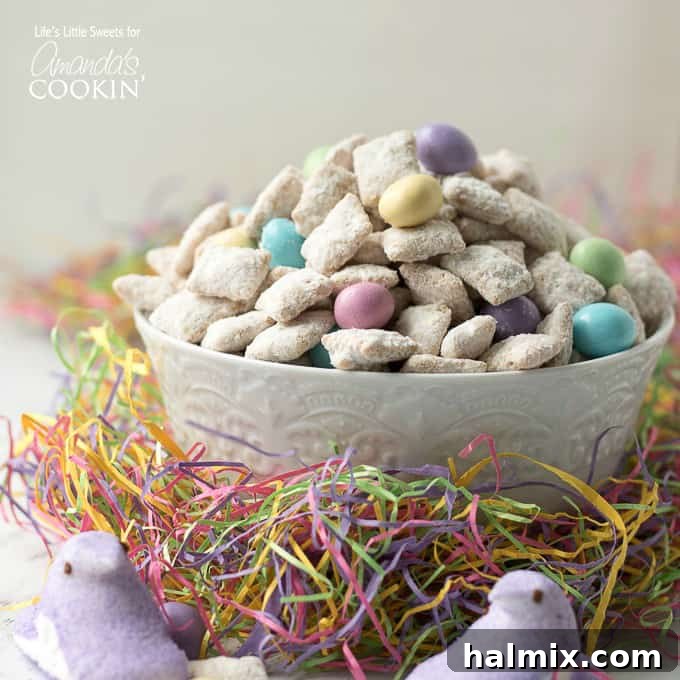 Colorful Easter muddy buddies in a large mixing bowl