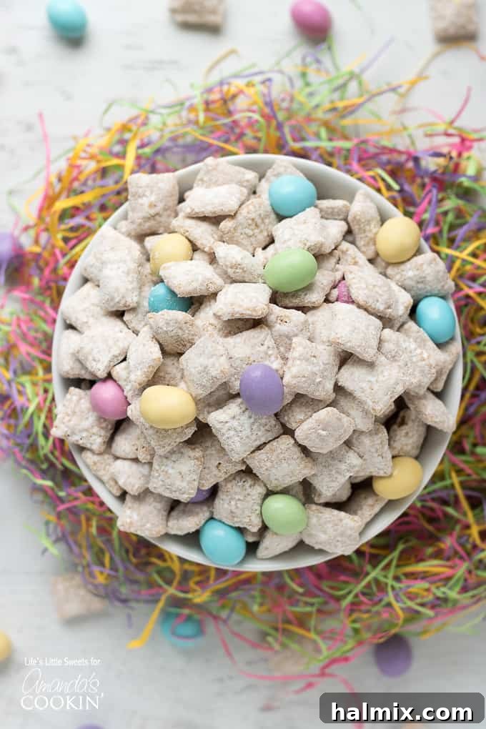Easter Muddy Buddies cereal being coated in chocolate mixture