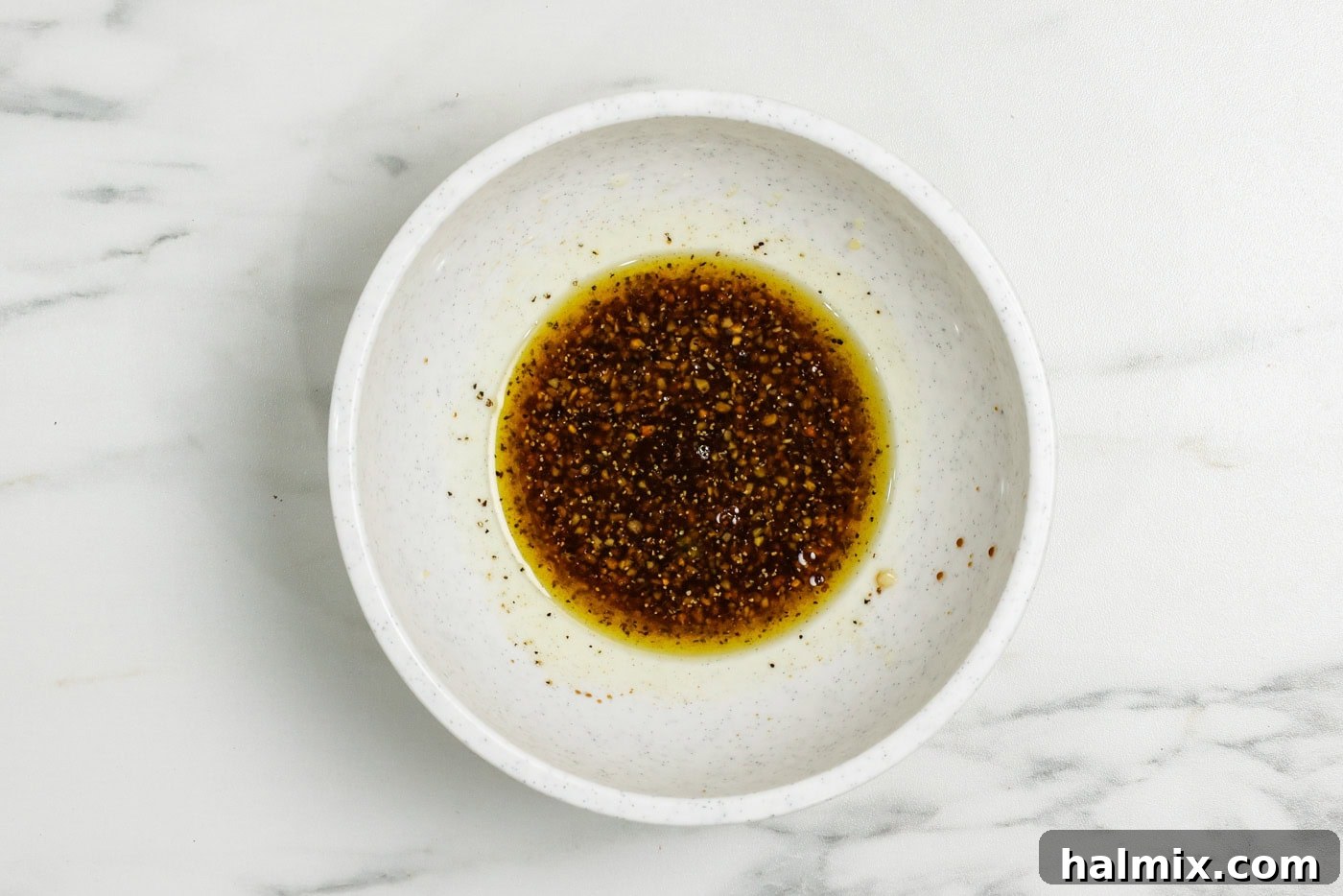 Melt-in-Your-Mouth Balsamic Glazed Carrots 5 Minced garlic, olive oil, and balsamic vinegar ready to coat carrots